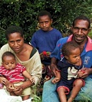 Umba with his wife Wari, and their children.