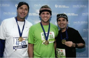 Tom Madden, Chad Madden and Gary Lewis show off their New York City marathon medals.
